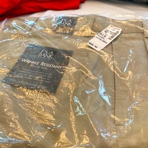 Long never worn in bag mens pants2 pair one khaki the other na y